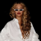 Beyoncé Paired a Cocktail Purse With a Feathered Valentino Top and Altuzarra Flairs on a Yacht