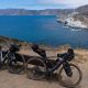Handlebar packs on bikes with California coast in background