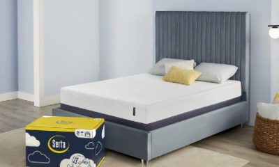 An image of the Serta EZ Tote mattress on a bed, next to its box.