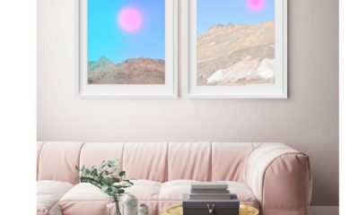 Diptych style pair of paintings above a couch called