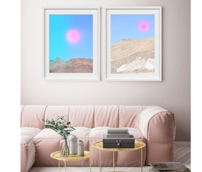 Diptych style pair of paintings above a couch called