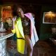 jennifer hudson poses inside a home wearing an animal print bodysuit and multicolored blazer