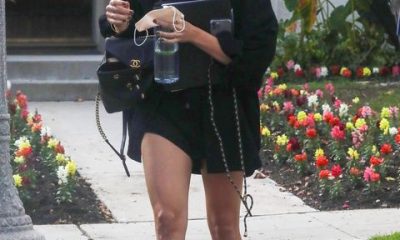 margot robbie out in a top and tiny micro shorts