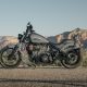 2022 Indian Dark Horse motorcycle parked beside the road with a mountain backdrop