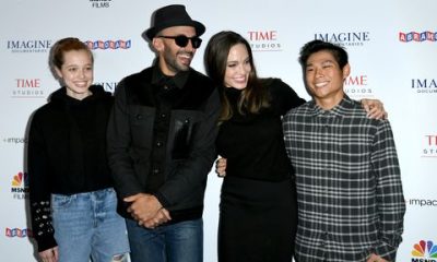 angelina jolie, shiloh, pax, and jr at the premiere of paper and glue