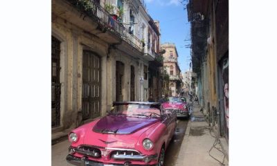 Pink classic car in Cuba streets