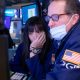 Global stocks bounce back as volatile weekend trade sinks 'frothy' Bitcoin