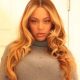 Here's Beyoncé Channeling Her Inner ‘Gossip Girl’ Prep in a Pleated Mini Skirt