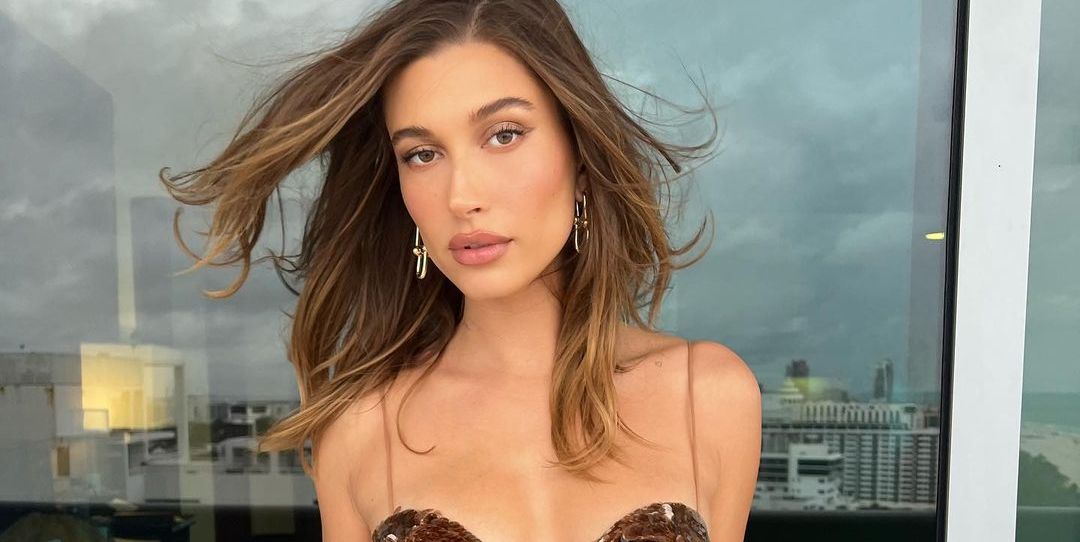 Here's Hailey Bieber Looking Like a Supermodel in a Bronze Sequin Dress for Her Friend's Wedding