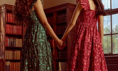 two models wear hill house home nap dresses included in the hill house home nap dress sale while standing in a library