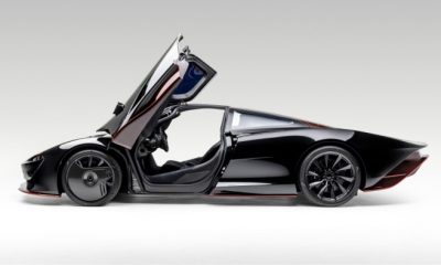 Black Mclaren Speedtail with its doors open hypercars