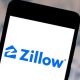 Why did Zillow get out of the house flipping business?