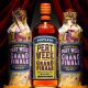 Bottles of whiskey that read Peat Week Grand Finale