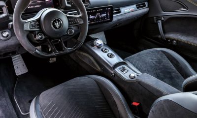 Black fabric interior of a sports car.