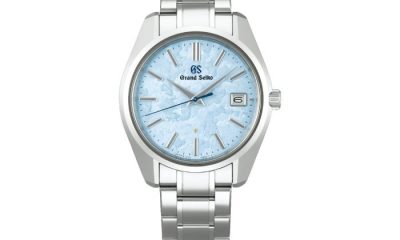 Grand Seiko SBGP017 with a blue dial on a white background.