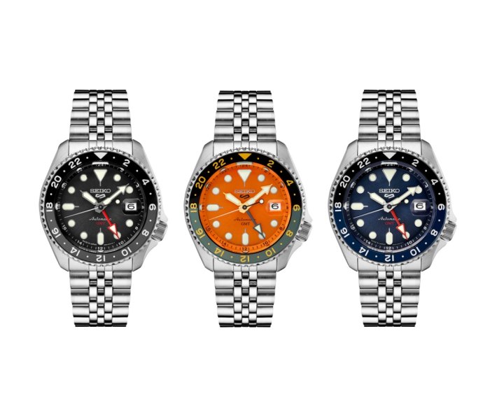 Three Seiko 5 Sports GMT watches on a white background