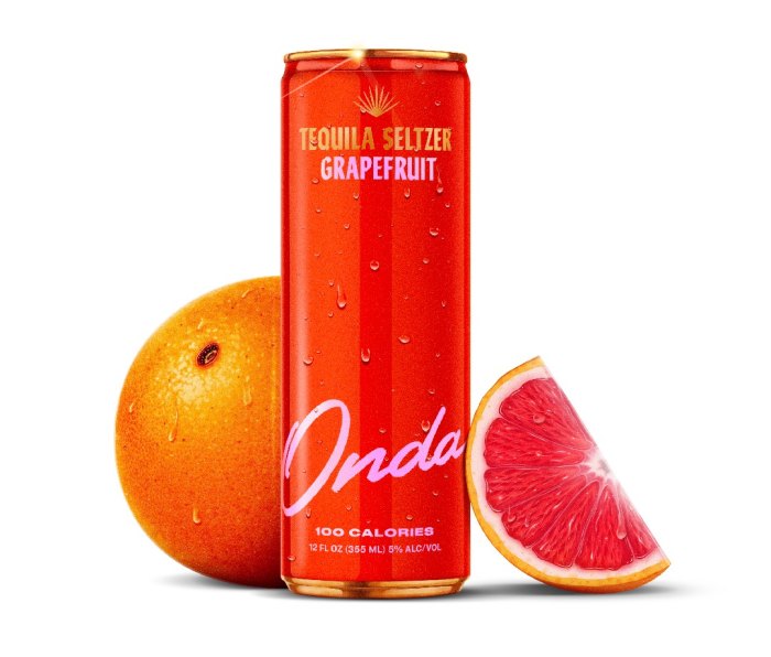 Can of Onda Tequila Selter beside a grapefruit and grapefruit slice.