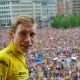 2022 Tour de France champion, Denmark's Jonas Vingegaard, wearing his yellow jersey with crowd in the background