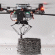 The Download: authoritarian tech, and tower-building drones