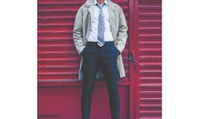 Man wearing Knickerbocker York Raincoat, Cole Haan Cap Toe Oxford, Brooks Brothers Slim Fit Dress Shirt, Brooks Brothers Plaid Tie, and Alexander McQueen Trousers