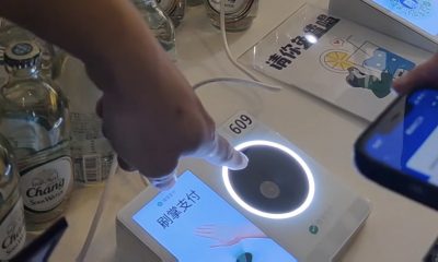 Screenshot of one of the videos showing a WeChat palm-print payment device.